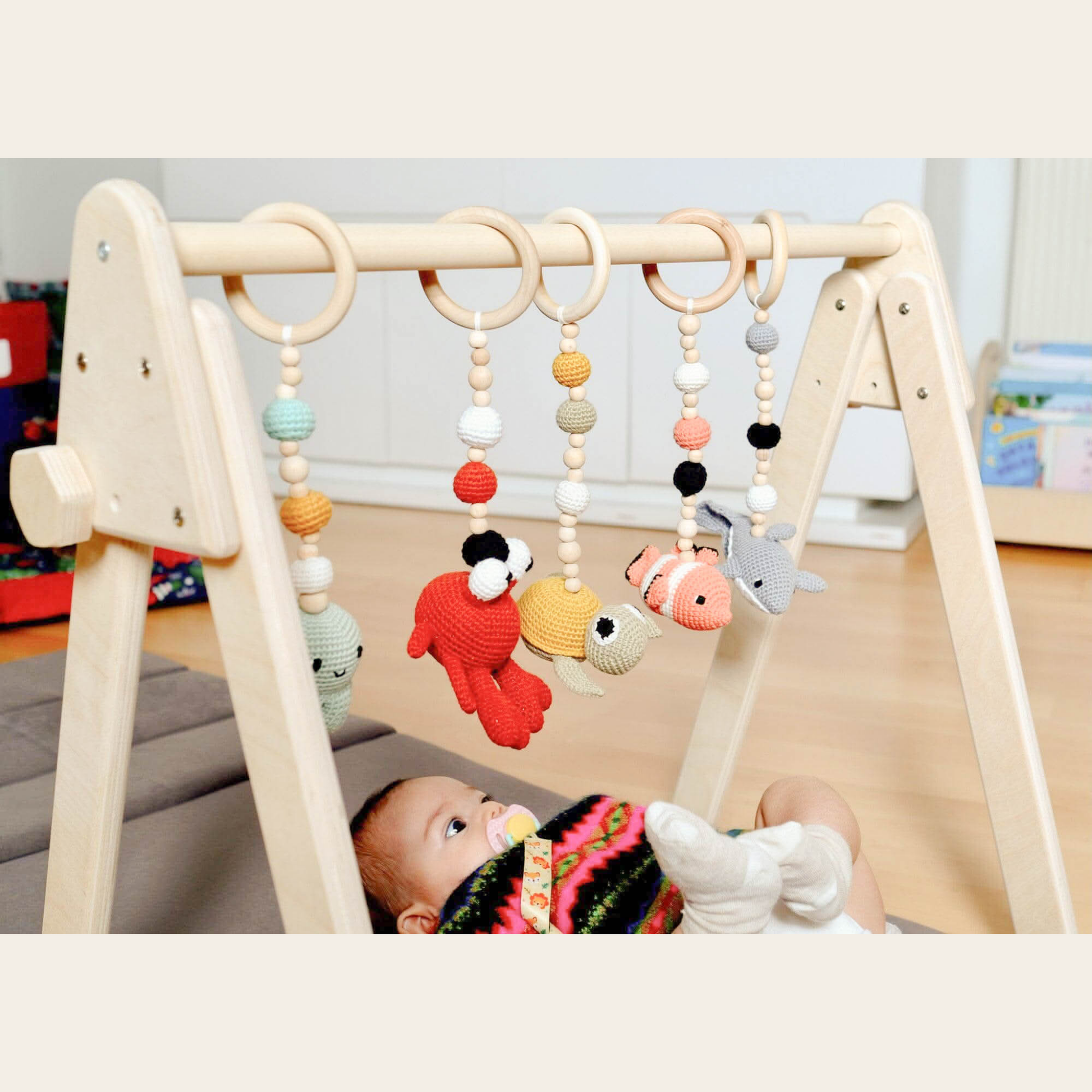 baby activity gym with themed hanging toys